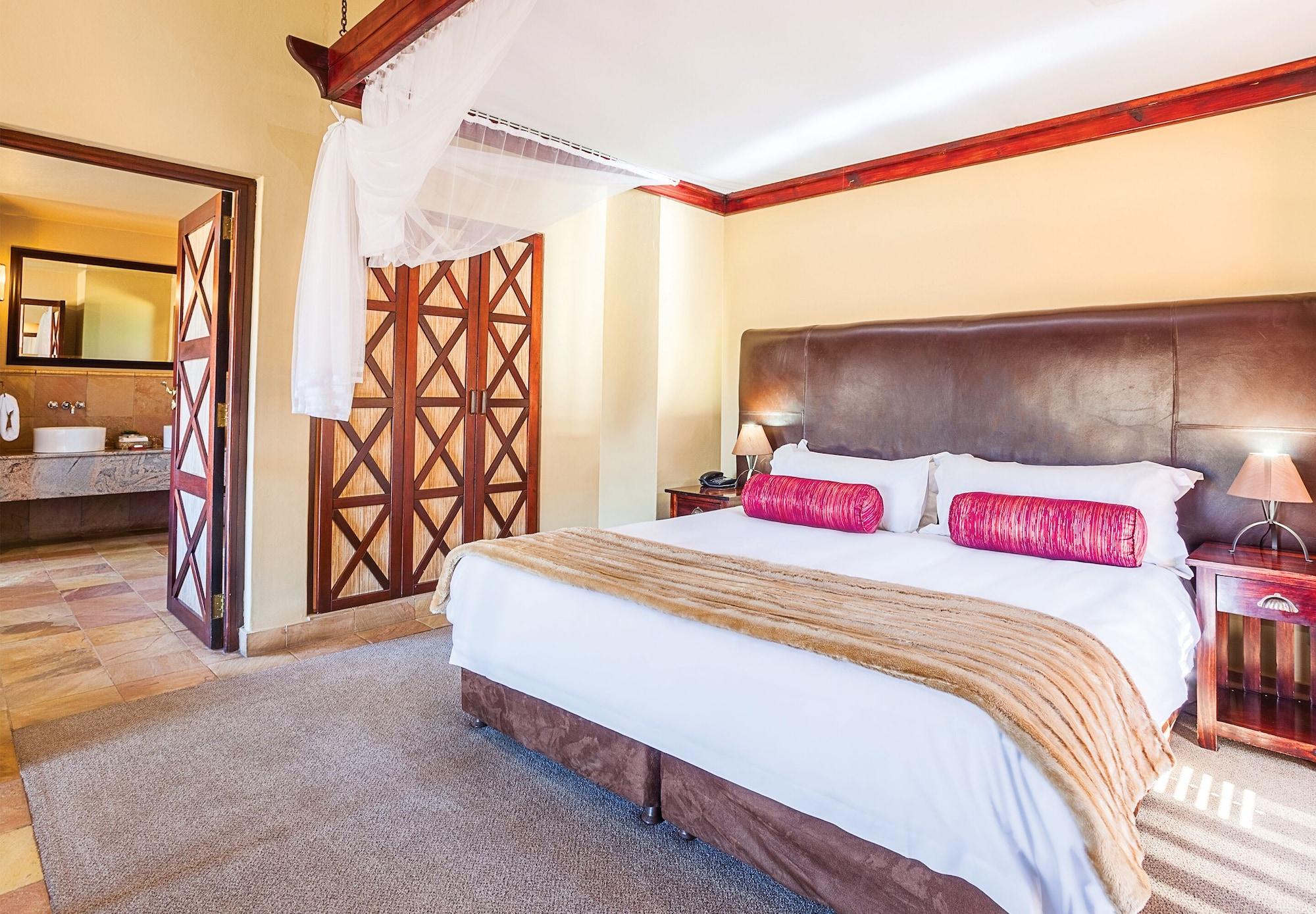 Kloofzicht Lodge & Spa ครูเกอร์สดอร์ป ภายนอก รูปภาพ A bedroom at the Kingdom Hotel